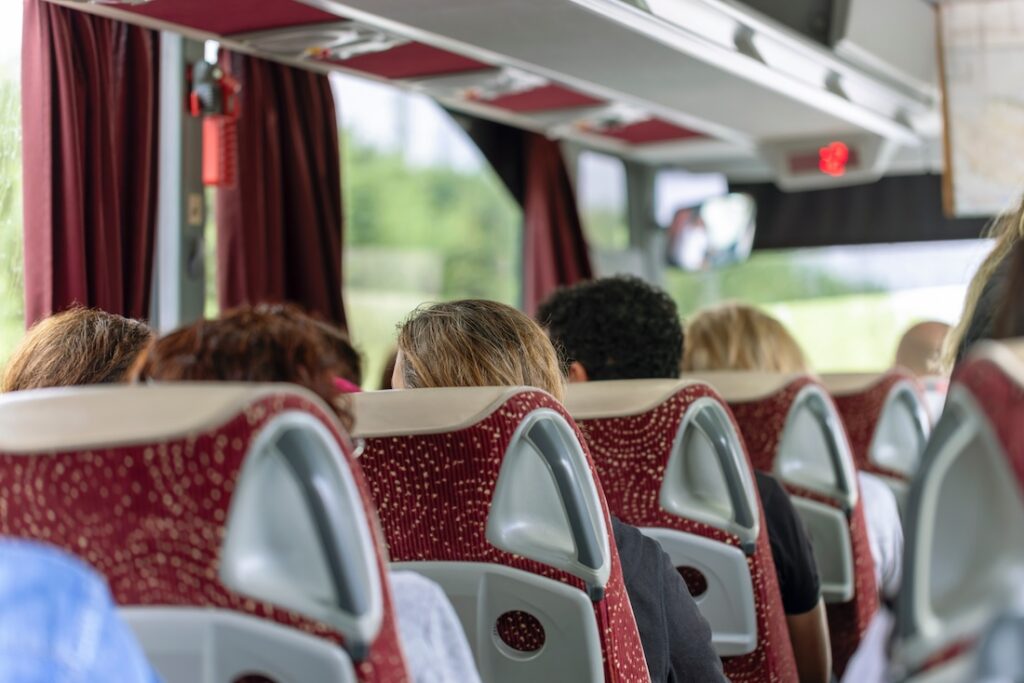 View of the passengers inside a stage coach bus. Bus interior trip