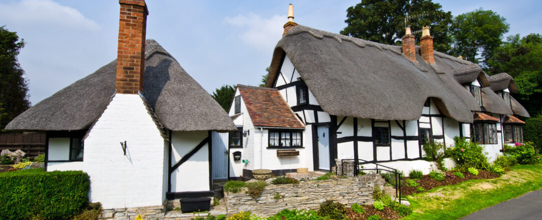 Thatched roof house in the countryside